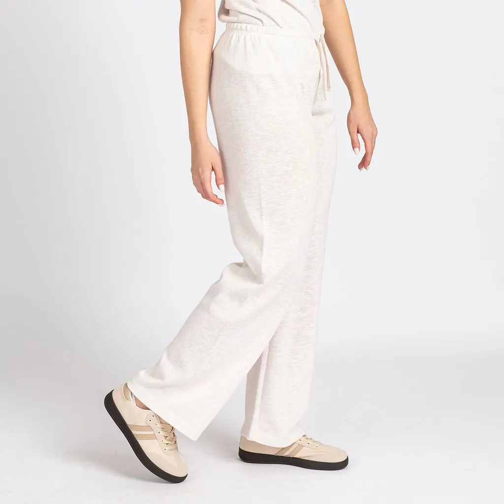 מכנסיים וחצאיות קרם L