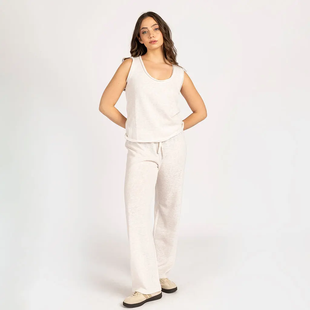 מכנסיים וחצאיות קרם L